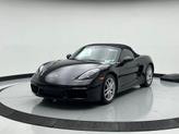 Photo of 2024 Jet Black Metallic Porsche 718 Boxster