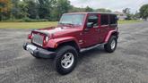 Thumbnail of 2012 Deep Cherry Red Crystal Pearlcoat Jeep Wrangler Unlimited
