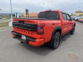 Thumbnail of 2025 Afterburn Orange Nissan Frontier