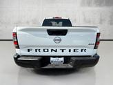 Thumbnail of 2023 Glacier White Nissan Frontier