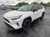 Thumbnail of 2024 Wind Chill Pearl/Midnight Black Metallic Toyota RAV4 Hybrid