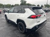 Thumbnail of 2024 Wind Chill Pearl/Midnight Black Metallic Toyota RAV4 Hybrid