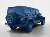 Thumbnail of 2025 Black Clearcoat Jeep Wrangler