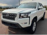 Thumbnail of 2024 Glacier White Nissan Frontier