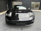 Thumbnail of 2024 Jet Black Metallic Porsche Taycan