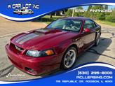 Photo of 2004 Burgundy Ford Mustang