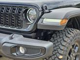 Thumbnail of 2025 Black Clearcoat Jeep Wrangler