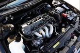 Thumbnail of 2002 Black Sand Pearl Toyota Corolla