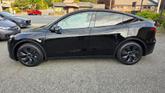Thumbnail of 2024 Solid Black Tesla Model Y