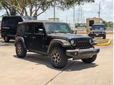 Thumbnail of 2021 Black Clearcoat Jeep Wrangler Unlimited