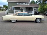 Photo of 1976 Yellow Cadillac DeVille