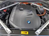 Thumbnail of 2025 Black Sapphire Metallic BMW X5 PHEV