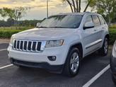 Thumbnail of 2012 Stone White Jeep Grand Cherokee