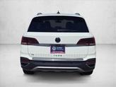Thumbnail of 2024 Pure White w/Deep Black Roof Volkswagen Taos