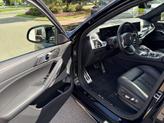 Thumbnail of 2024 Black Sapphire Metallic BMW X6 M