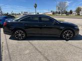 Thumbnail of 2013 Tuxedo Black Metallic Ford Taurus