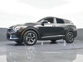 Thumbnail of 2023 Fusion Orange Kia Sportage Hybrid