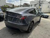 Thumbnail of 2021 Midnight Silver Metallic Tesla Model Y
