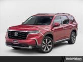 Photo of 2025 Radiant Red Metallic II Honda Pilot