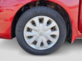 Thumbnail of 2015 Red Brick Nissan Versa