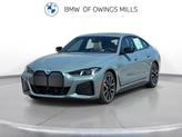 Photo of 2025 Cape York Green Metallic BMW i4 Gran Coupe