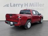 Thumbnail of 2024 Cardinal Red Metallic Nissan Frontier