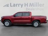 Thumbnail of 2024 Cardinal Red Metallic Nissan Frontier