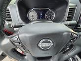 Thumbnail of 2024 Cardinal Red Metallic Nissan Frontier