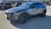 Thumbnail of 2025 Machine Gray Metallic Mazda CX-30