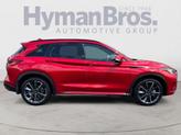 Thumbnail of 2025 Dynamic Sunstone Red INFINITI QX50