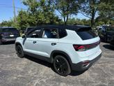 Thumbnail of 2025 Monument Gray w/Deep Black Roof Volkswagen Taos