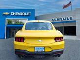 Thumbnail of 2024 Yellow Splash Metallic Tri-coat Ford Mustang
