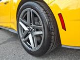 Thumbnail of 2024 Yellow Splash Metallic Tri-coat Ford Mustang