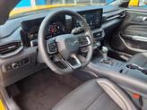 Thumbnail of 2024 Yellow Splash Metallic Tri-coat Ford Mustang