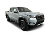 Thumbnail of 2025 Boulder Gray Pearl Nissan Frontier