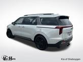 Thumbnail of 2025 Ivory Silver Kia Carnival Hybrid