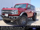 Photo of 2025 Ruby Red Metallic Tinted Clearcoat Ford Bronco