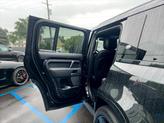 Thumbnail of 2023 Santorini Black Metallic Land Rover Defender