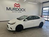 Photo of 2015 Super White Toyota Corolla