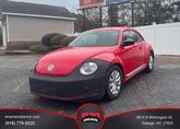 Photo of 2013 Tornado Red Volkswagen Beetle