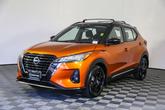 Thumbnail of 2022 Monarch Orange / Super Black Nissan Kicks