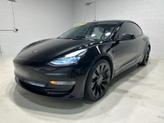 Thumbnail of 2022 Solid Black Tesla Model 3