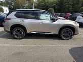 Thumbnail of 2026 Champagne Silver Metallic/Super Black Nissan Rogue