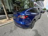 Thumbnail of 2024 Deep Blue Metallic Tesla Model Y
