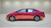 Thumbnail of 2025 Scarlet Ember Tintcoat Nissan Versa