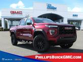 Photo of 2026 Volcanic Red Tintcoat GMC Canyon