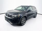 Thumbnail of 2024 Deep Black Pearl Volkswagen Taos