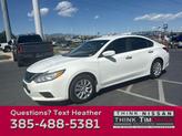 Photo of 2016 Glacier White Nissan Altima