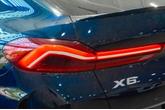 Thumbnail of 2024 Carbon Black Metallic BMW X6