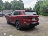 Thumbnail of 2025 Scarlet Ember Nissan Rogue